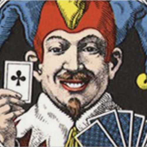 A man in a jester hat holding cards.