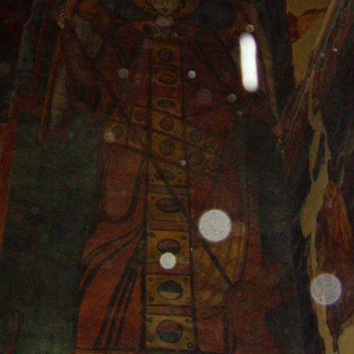 A painting of a man in the middle of a room.