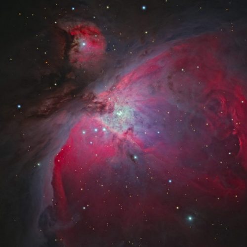 A picture of the orion nebula taken by a telescope.