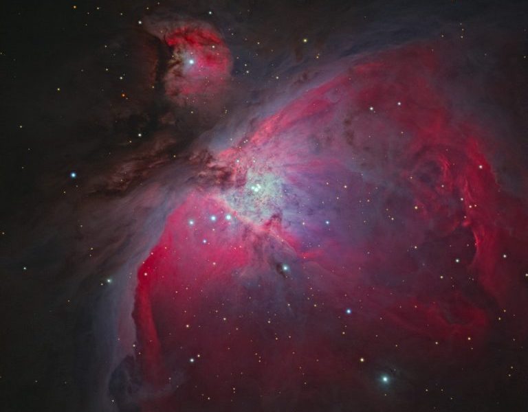 A picture of the orion nebula taken by a telescope.