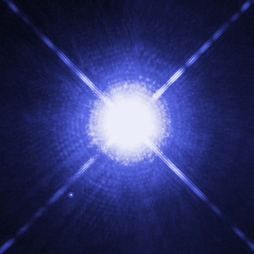A star with two bright white spots in the middle.