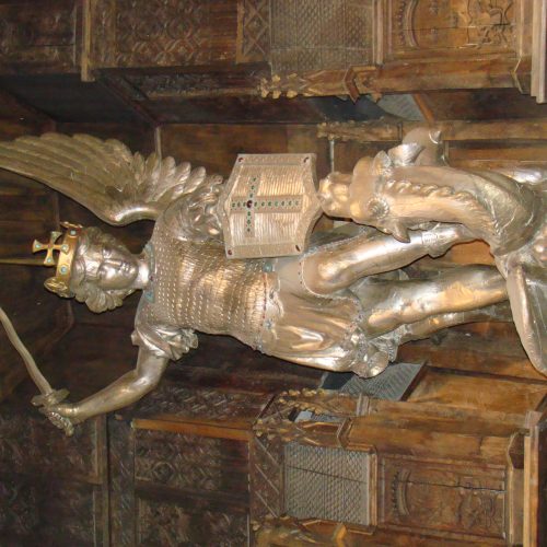 A statue of an angel with wings and a halo.