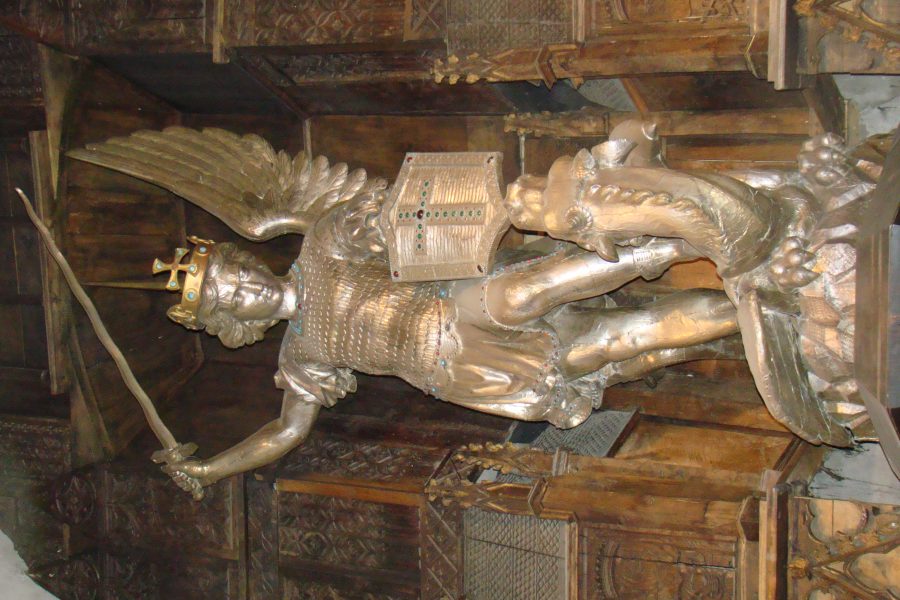 A statue of an angel with wings and a halo.