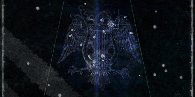 A picture of the eagle with wings spread.