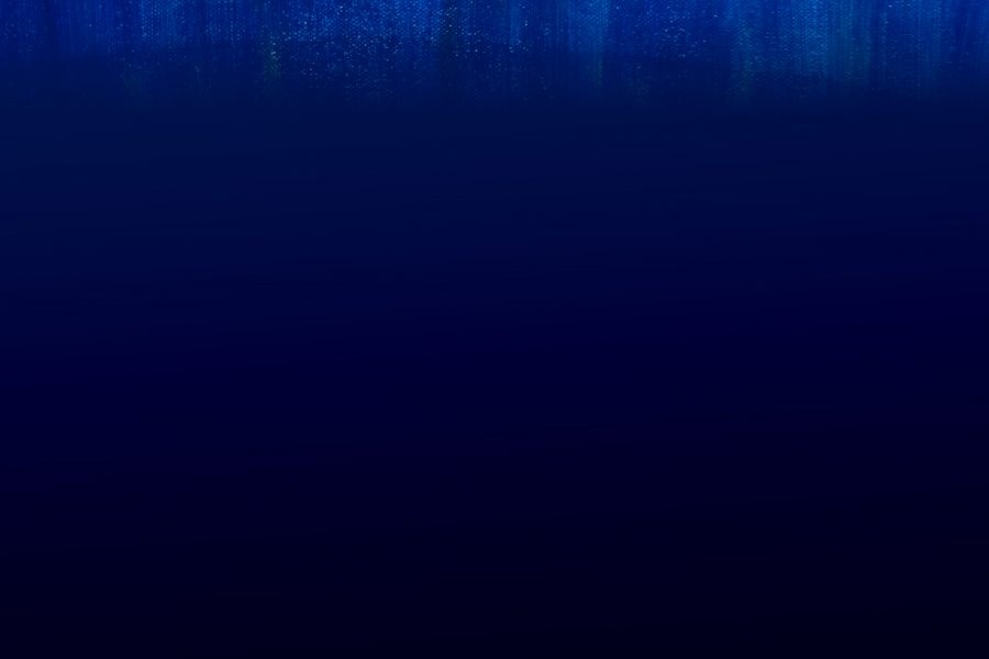 A dark blue background with some white lines