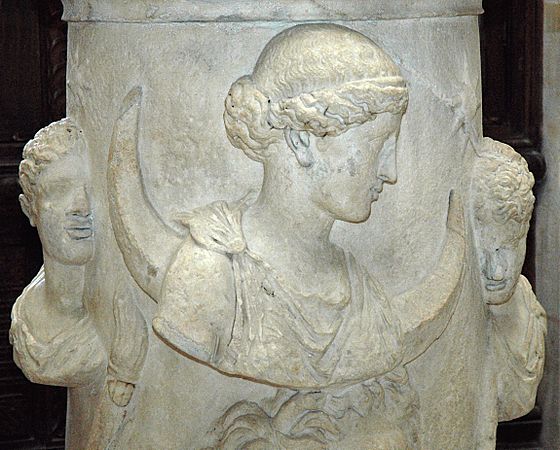A close up of the face on a statue