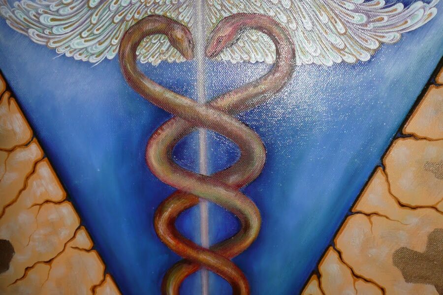 A painting of a medical symbol on the side of a wall.